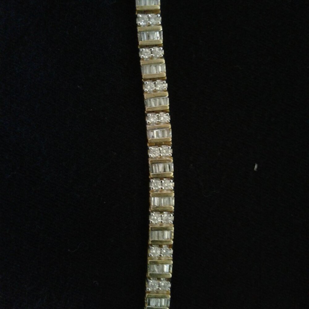 Diamonds International 7.5" Gold & Diamond Tennis Bracelet